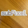 subPixel Sticker on wood